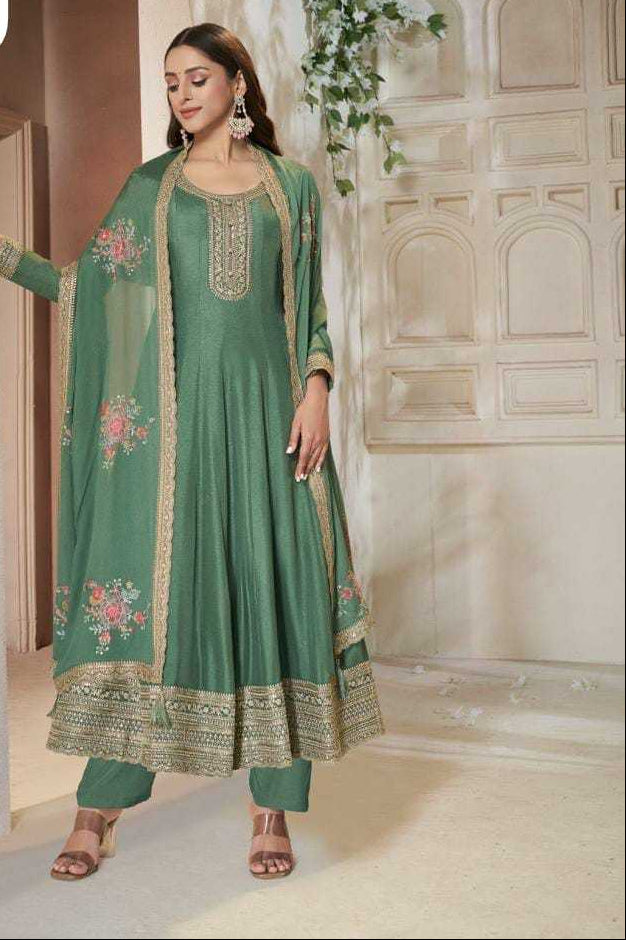https://keevaaexports.b-cdn.net/images/colorwiseimage/2025/09/ynf-dola-silk-kesh530-1656-suits-dresses-wholesale-embroidery-suits-anarkali-suits-party-wear-suits-manufacturer-2025-09-20_09_15_30-68ce235adb601.jpg