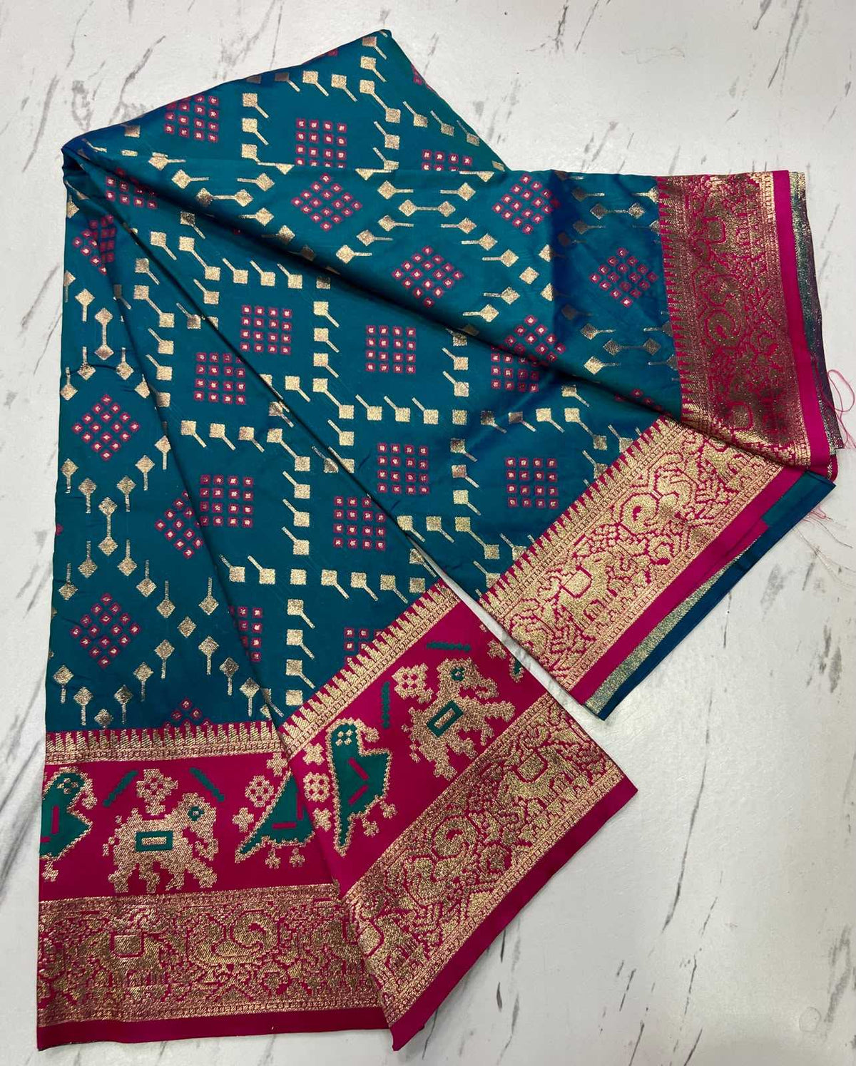 Amrita Patola Silk Zari Border Saree