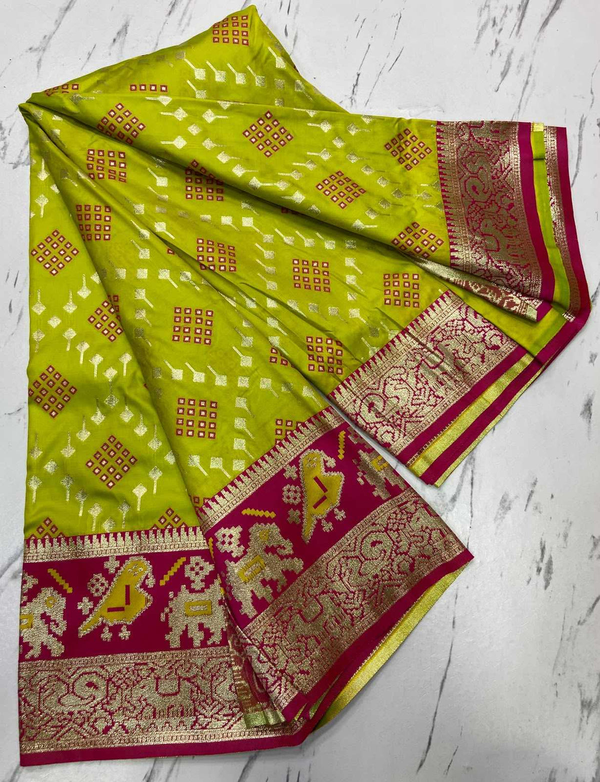 Amrita Patola Silk Zari Border Saree