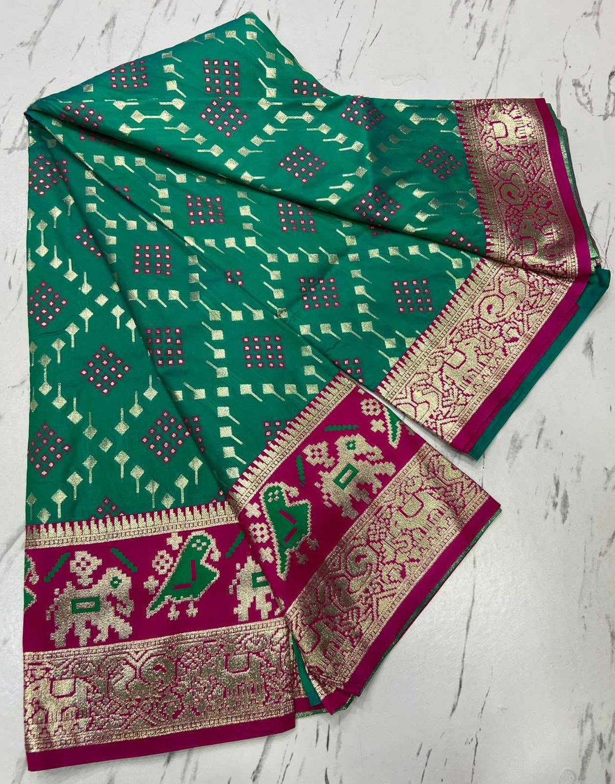 Amrita Patola Silk Zari Border Saree