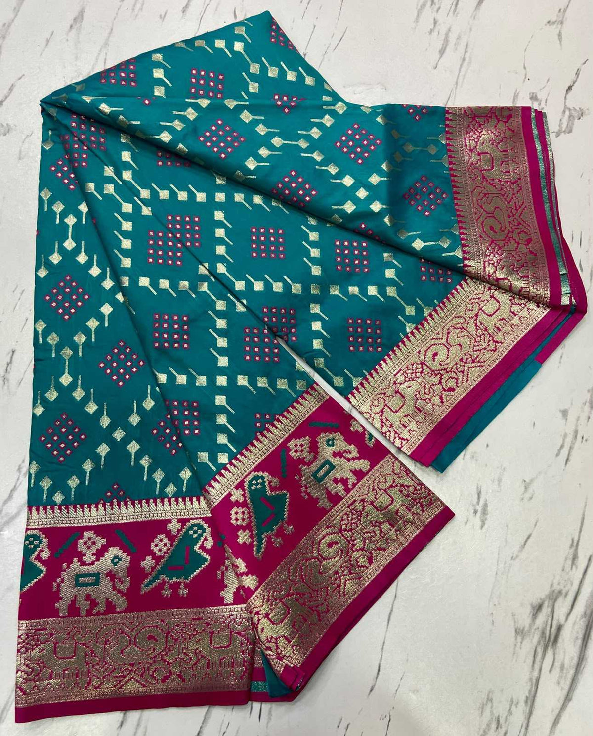 Amrita Patola Silk Zari Border Saree