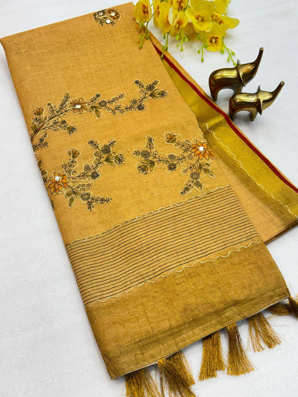 Avika Linen Zari Border Saree