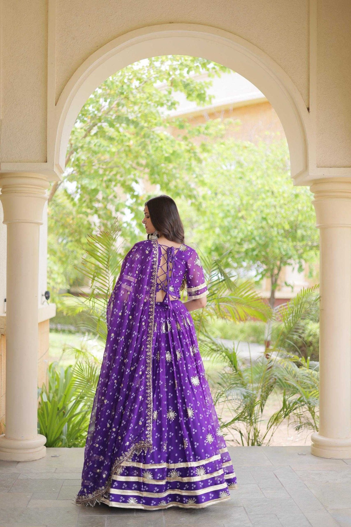 Faux Georgette Printed Lehenga in Black