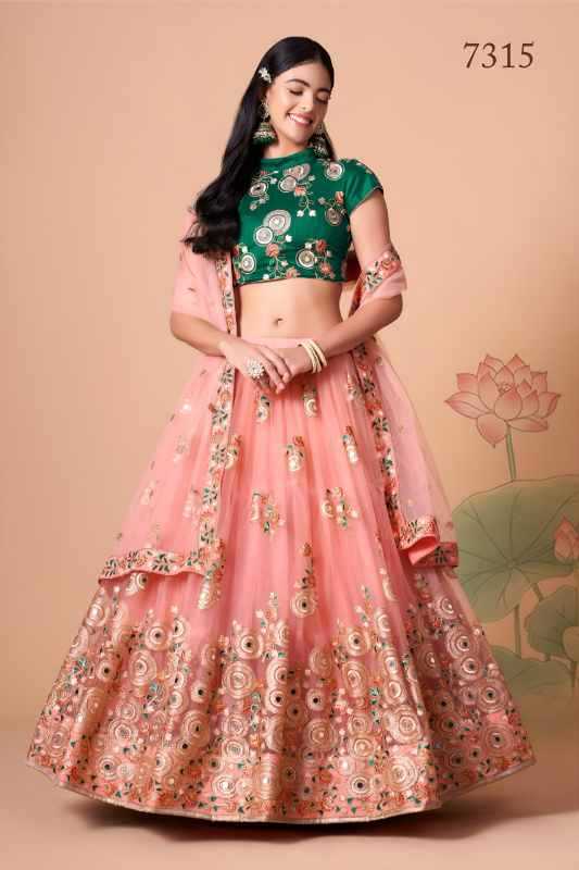 Soft Net Celebrity Lehenga in Green •