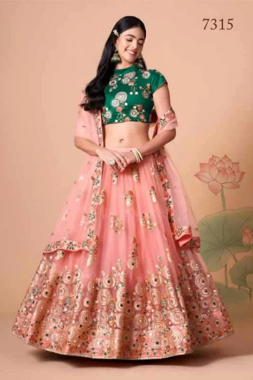 Soft Net Celebrity Lehenga in Green •