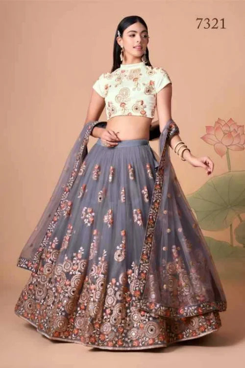 Soft Net Embroidered Lehenga in Off-White •
